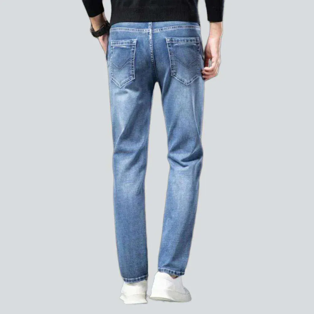 Diagonal pocket sanded men's jeans