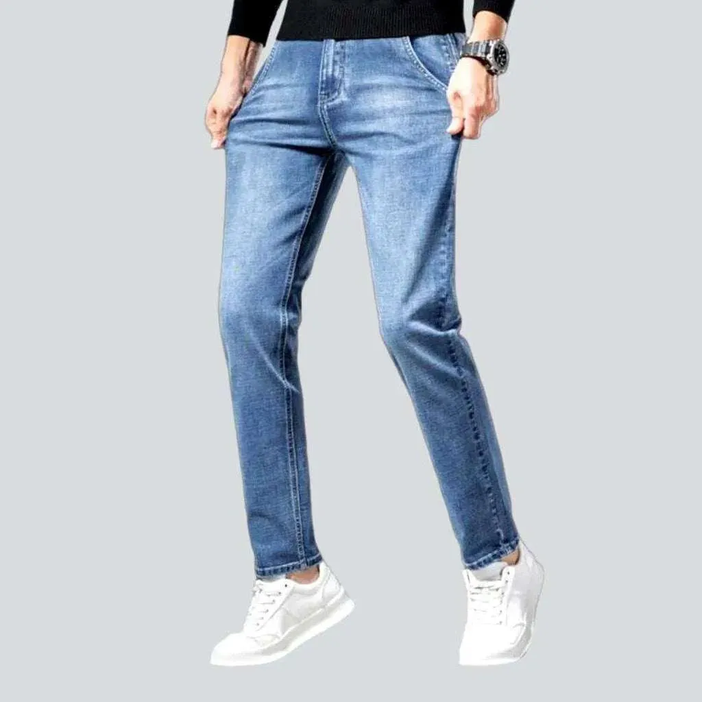 Diagonal pocket sanded men's jeans