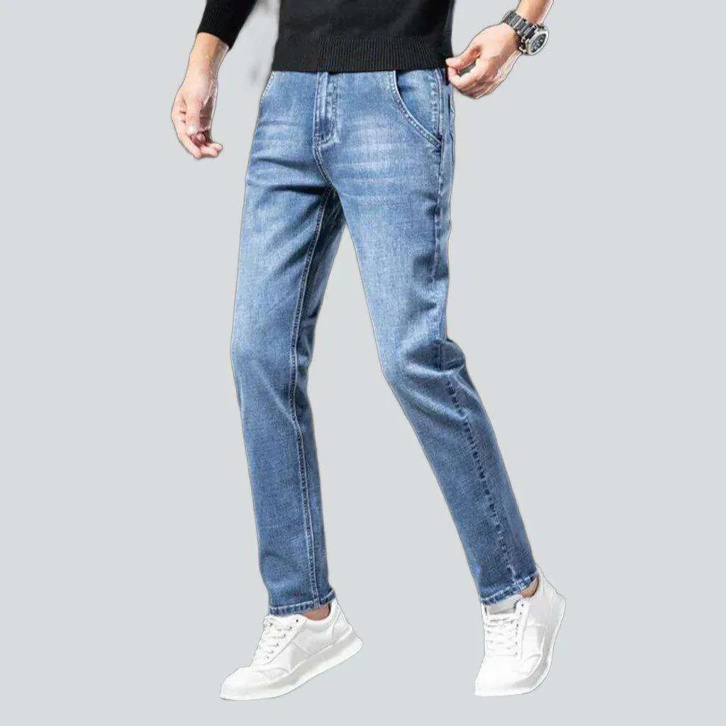 Diagonal pocket sanded men's jeans